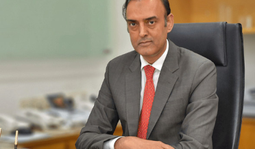 GOVERNOR STATE BANK JAMIL AHMAD POSING IN OFFICE