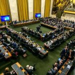 The UN Conference on Disarmament hall in Geneva featuring national delegates and the presiding Pakistani representative.